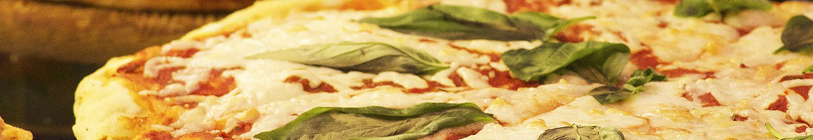 Eating Italian Pizza at La Delizia Pizza restaurant in Fredericksburg, VA.